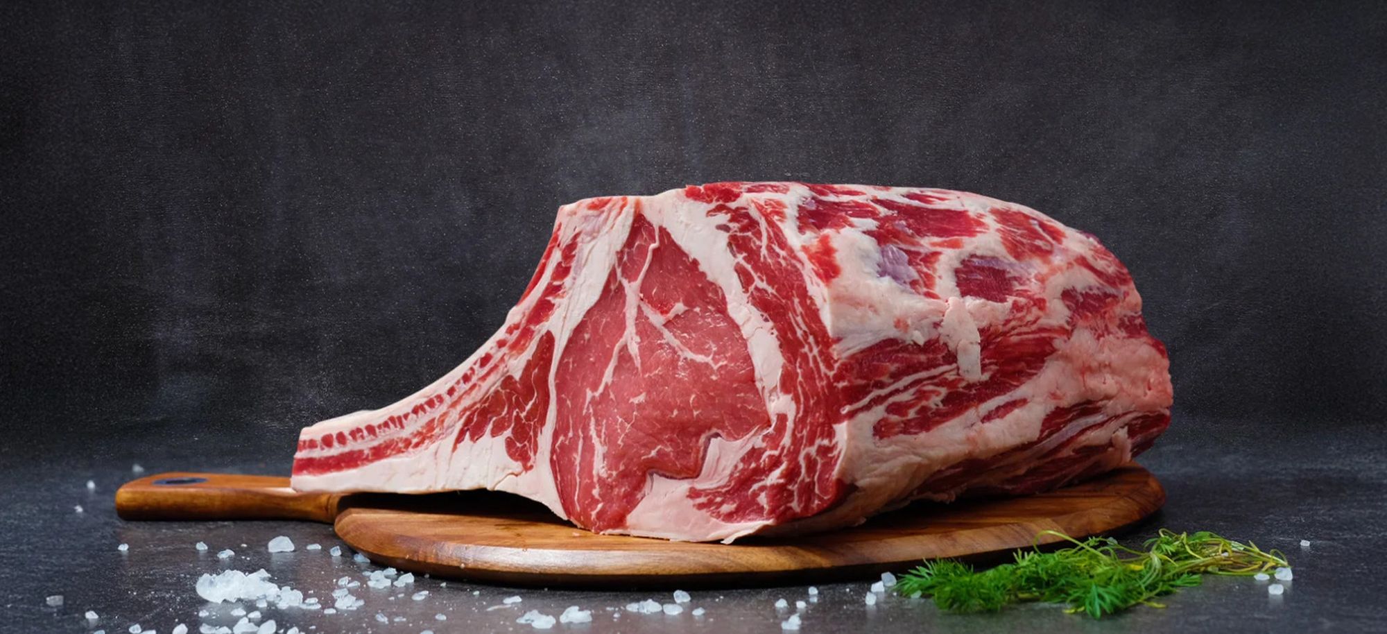 A premium fresh-cut piece of Australian beef resting on a wooden board